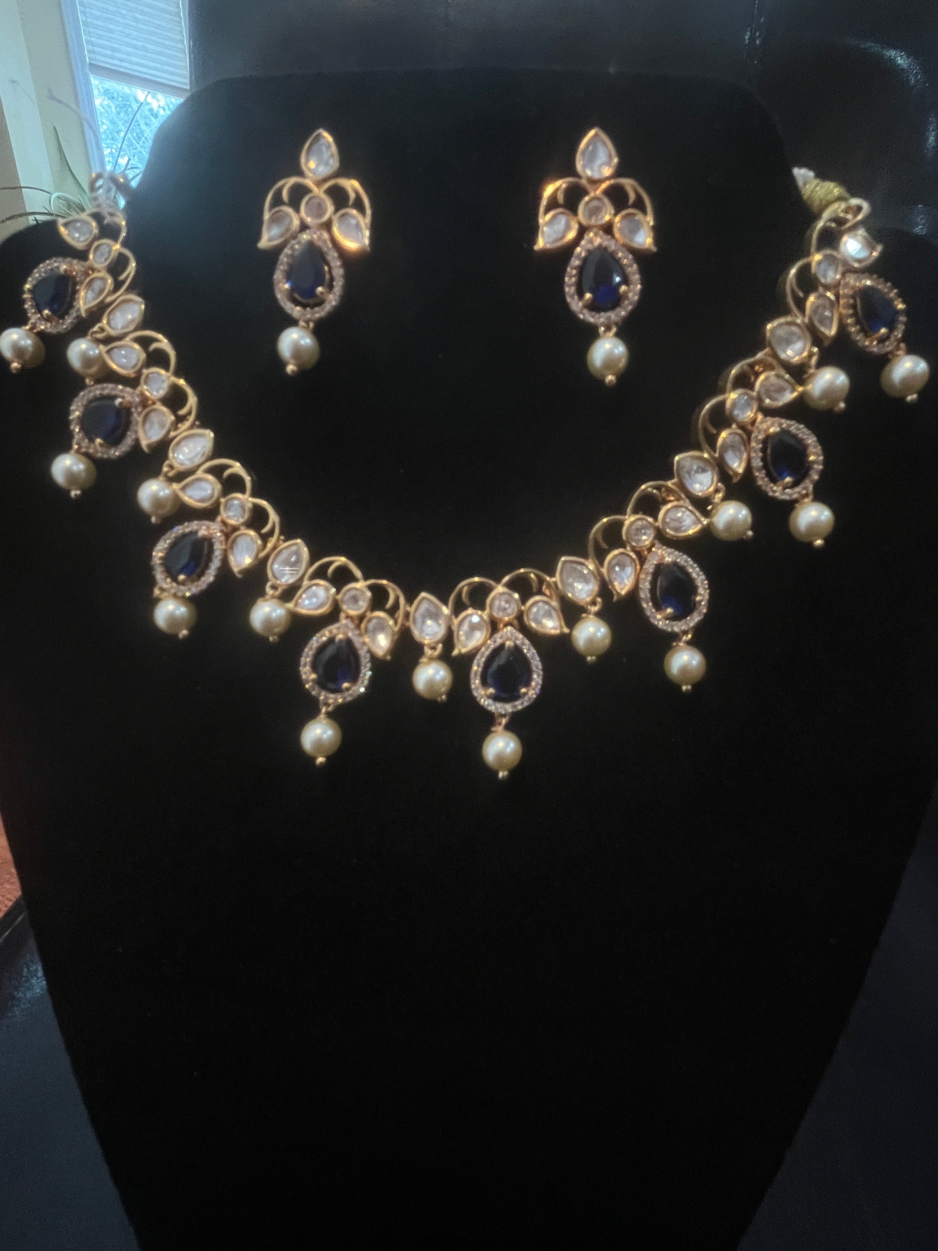 Traditional emerald green CZ necklace set perfect for saree and lehenga styling