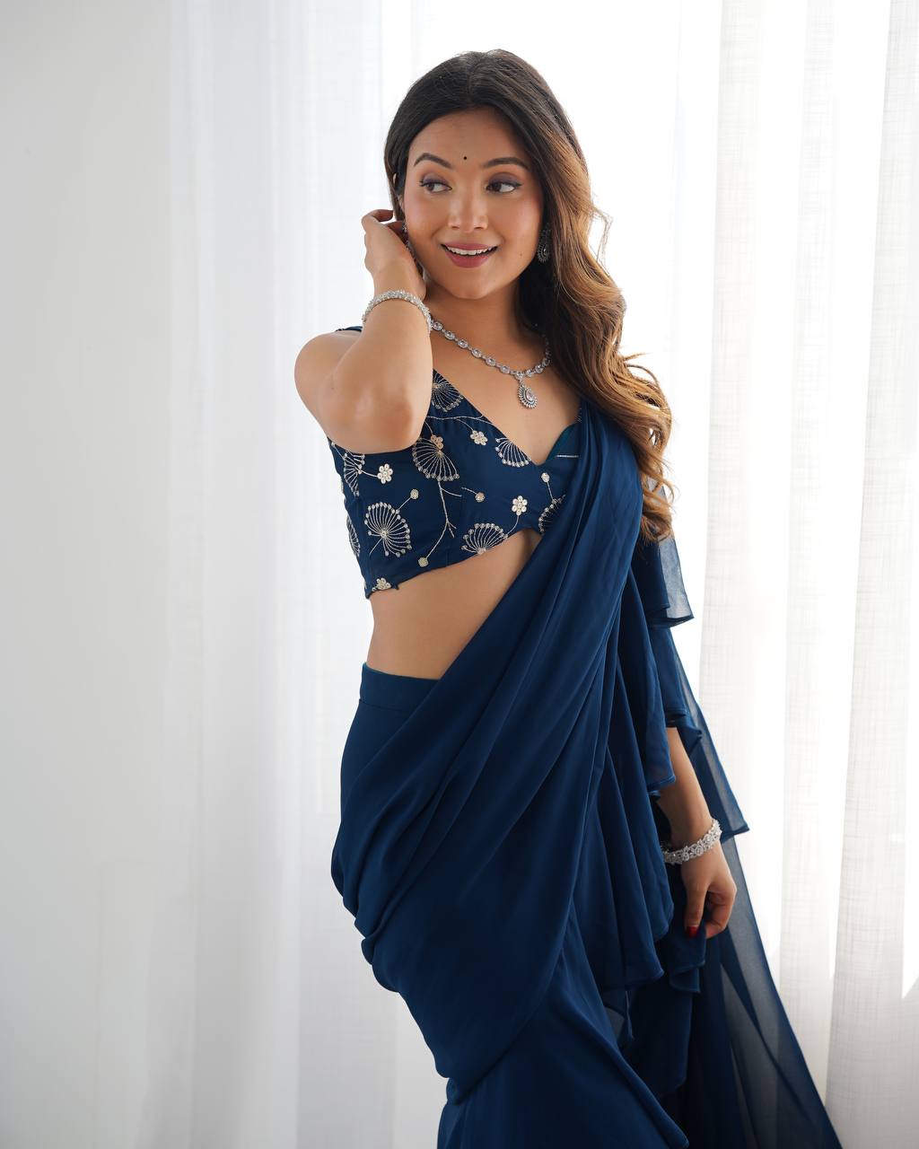 Navy Blue Ruffle Saree with Embroidered Blouse & Sharara Pants – Modern Festive Fusion Wear
