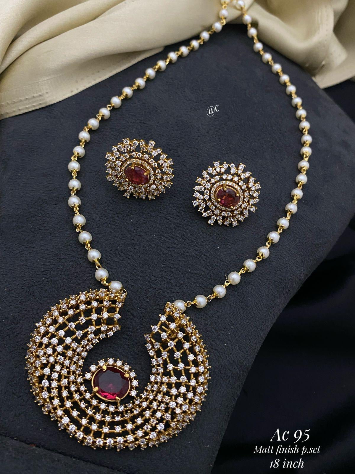 Festive emerald green CZ partywear necklace set with elegant finish